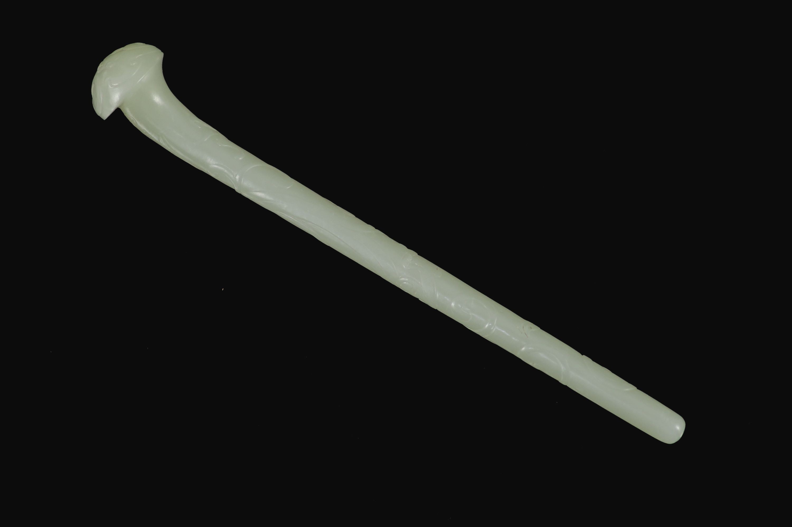 A Chinese pale celadon jade hair pin, 18th century, 16.3 cm